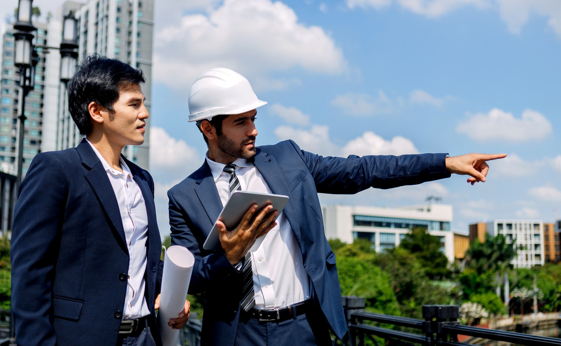 Two real estate developers exploring the project site.